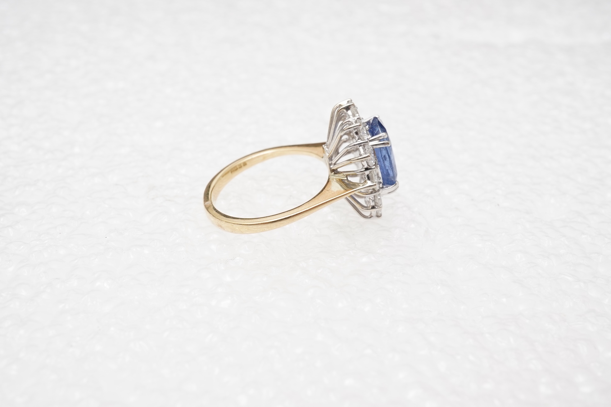 A sapphire and diamond cluster ring
